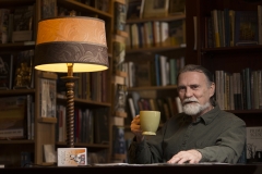 Robert Place, Ulster County artist drinks a cup of cappucino at Inquiring Minds bookstore in Saugerties